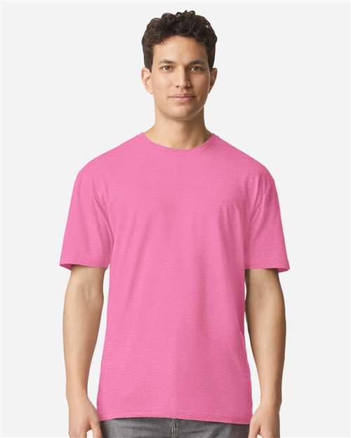 Gildan 100 white T-shirts stacked, showcasing a bulk pack of plain cotton shirts for casual wear or printing.
