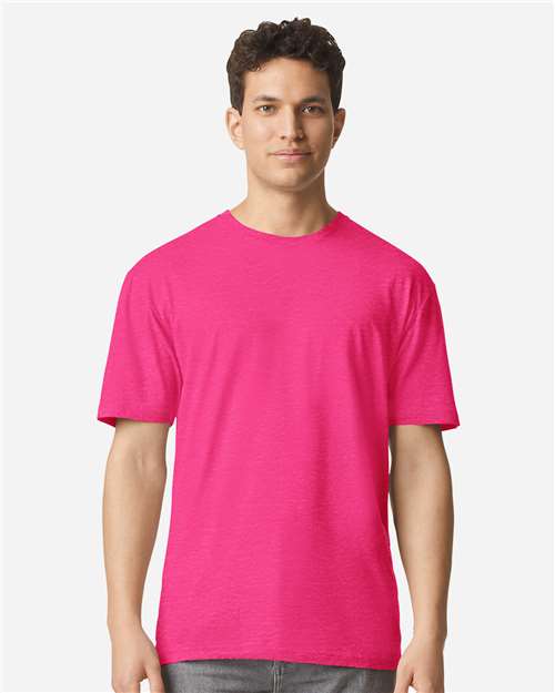 Gildan 100 plain white T-shirts stacked in a box, promotional deal on bulk T-shirt pack for wholesale purchase.