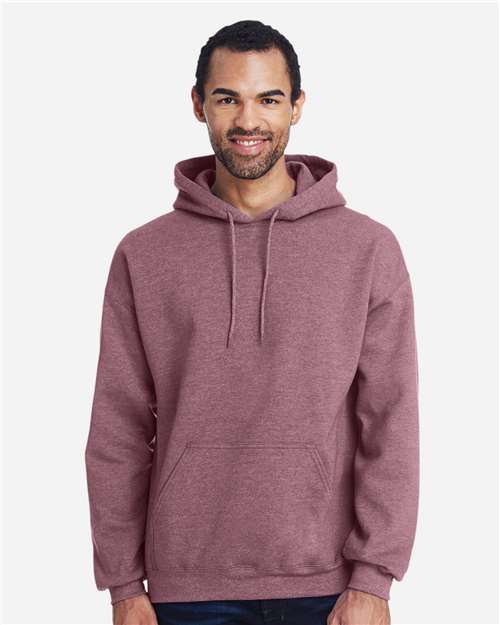 Gildan Unisex Heavy Blend™ hooded sweatshirt in heather gray, featuring a front pocket and drawstring hood.