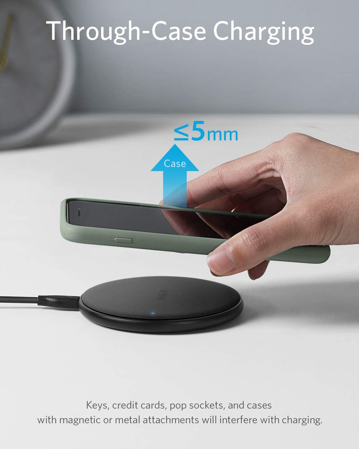 Anker 313 wireless charging pad with sleek black design for easy, cable-free smartphone charging.