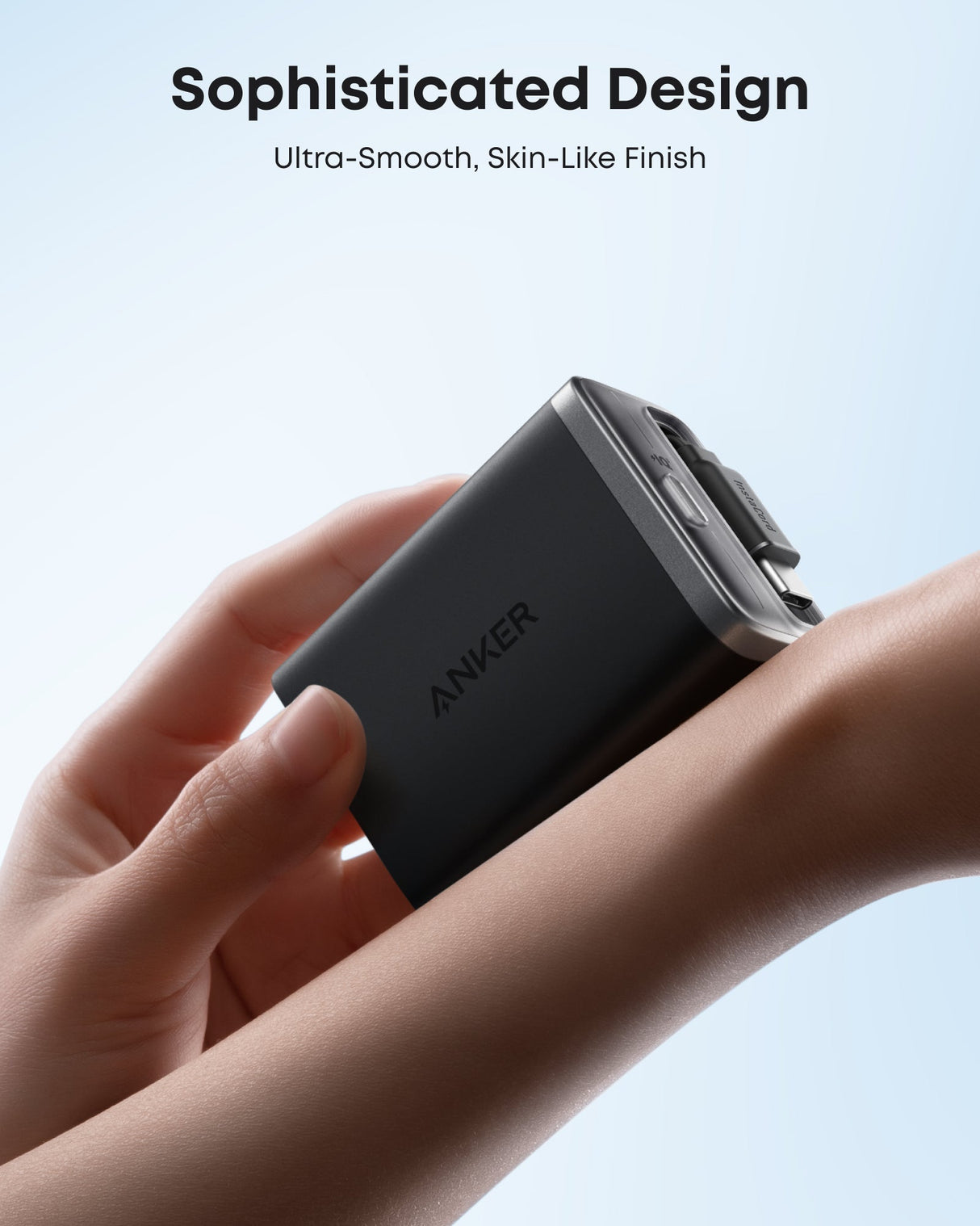 Anker Nano 35W charger with built-in retractable USB-C cable, compact travel power adapter for smartphones and tablets.