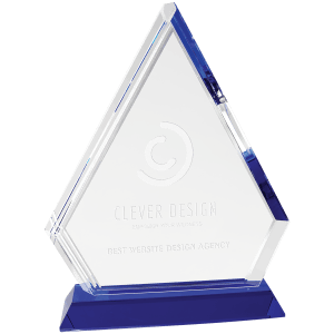 Large blue crystal diamond sculpture on a pedestal base, crafted by AKD Ink, with reflective facets and elegant presentation.