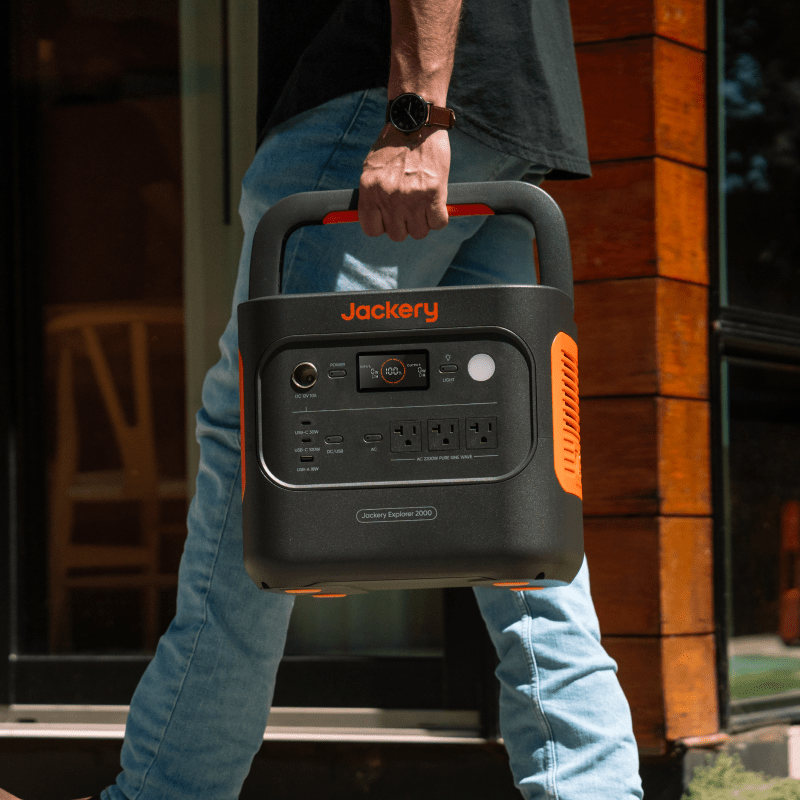 Refurbished Jackery Explorer 2000 V2 portable power station with multiple charging ports and LCD display for outdoor or backup use.