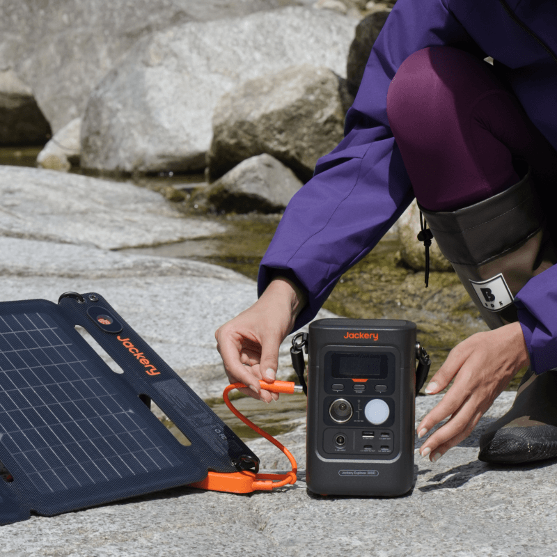 Jackery Explorer 300D portable power station with multiple outlets and digital display, compact and portable for outdoor use