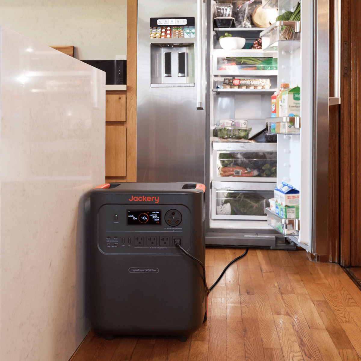 Jackery HomePower 3600 Plus portable power station with multiple outlets and digital display, black and gray design.