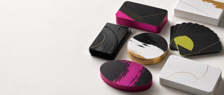 A selection of professionally printed business cards in varied premium finishes