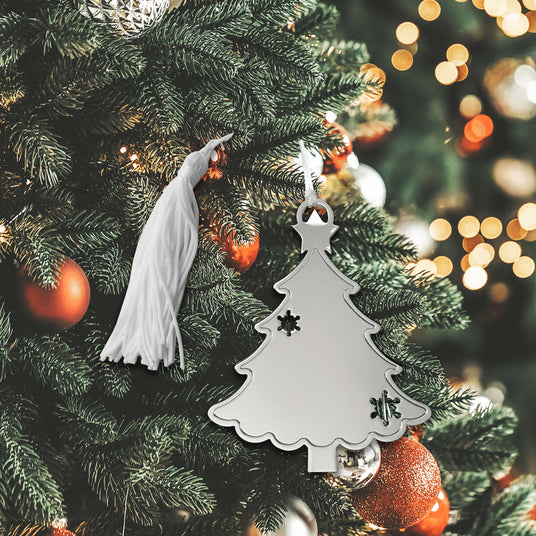 Holiday Tree Shaped Ornament With Snowflake Cutouts