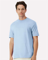 Assorted Gildan T-shirts in various colors, stacked neatly for display, highlighting the quality and variety of the product.