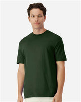 Gildan 100 plain T-shirts in assorted colors, stacked in a pile, available in a limited-time deal for bulk purchase.