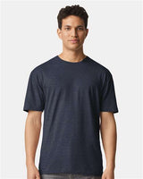 Gildan 100 white T-shirts displayed in a bundle, showcasing soft cotton fabric and classic fit for casual wear.