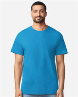 Gildan 100 white t-shirts stacked in a pile, showcasing a bulk deal offer for 100 shirts at $499