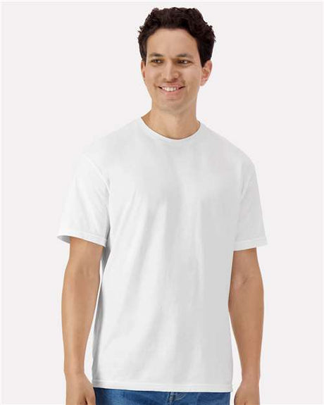 Gildan 100 plain T-shirts in various colors, neatly folded, perfect for casual wear, on a clean white background.