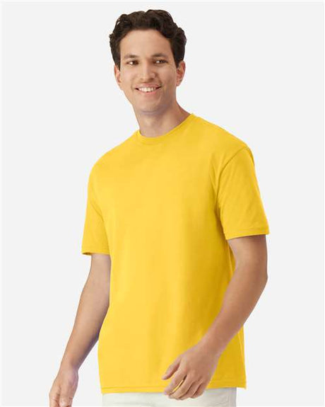 Gildan 100 plain white T-shirts arranged in a bundle, showcasing their soft fabric and classic fit for casual wear.