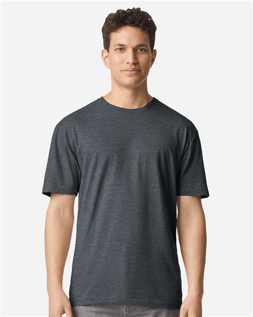 Gildan 100 plain white T-shirts displayed in a bundle, showcasing soft cotton fabric and classic fit for everyday wear.