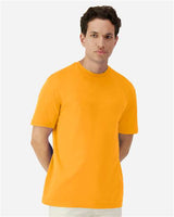 Gildan 100 white T-shirts stacked in a pile, showcasing a bulk deal offer for affordable wholesale shirts.