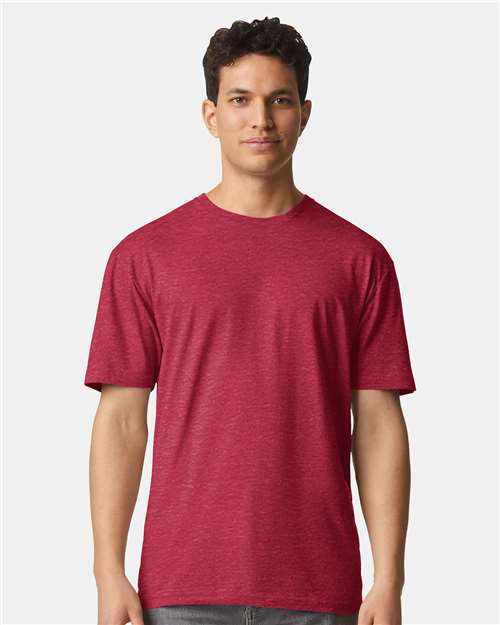 Gildan 100 plain white T-shirts arranged in a stack, showcasing comfortable cotton fabric and classic fit.