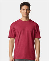 Gildan 100 plain white T-shirts arranged in a stack, showcasing comfortable cotton fabric and classic fit.