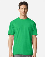 Gildan 100 white T-shirts laid out flat, showcasing their plain design and soft cotton fabric for bulk purchase deal.