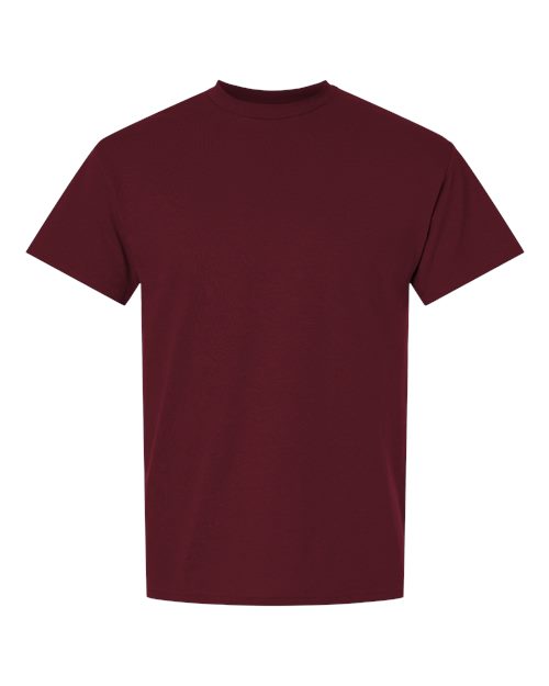 Gildan brand 100 white T-shirts stacked neatly, showing front view and soft cotton fabric for bulk clothing order.