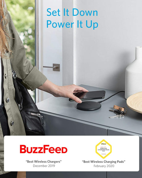 Anker 313 wireless charging pad with smooth surface for Qi-enabled smartphones, designed for quick and easy wireless charging.