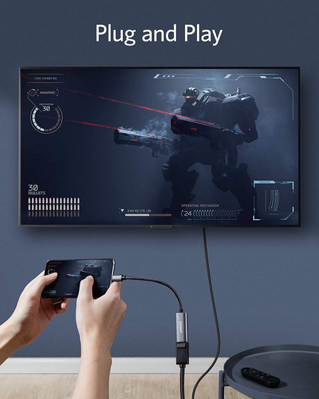 Anker PowerExpand USB-C to DisplayPort adapter connected to a laptop, displaying a high-resolution monitor.