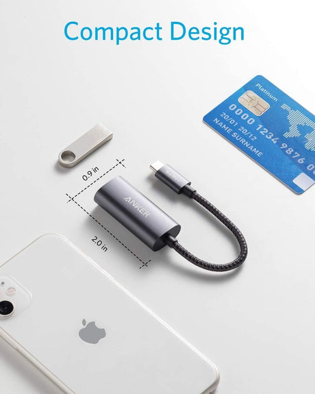 Anker PowerExpand USB-C to Gigabit Ethernet Adapter connected to a laptop for fast wired internet connection.