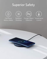 Anker 313 wireless charging pad with sleek design for convenient wireless phone charging on a flat surface.