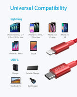 Red 6-foot Anker USB-C to Lightning charging cable laid out on a surface, highlighting durable design and flexible length.