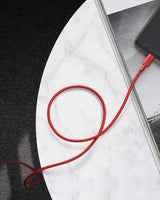Red 6-foot Anker USB-C to Lightning charging cable, durable and flexible for iPhone and Apple device charging.