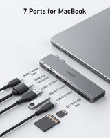 Anker 547 USB-C Hub for MacBook with charging port and multiple connections, shown with sleek black design and ports visible