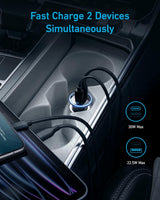 Anker 323 car charger with 52.5W power output, shown plugged into a vehicle's cigarette lighter socket with charging ports visible.