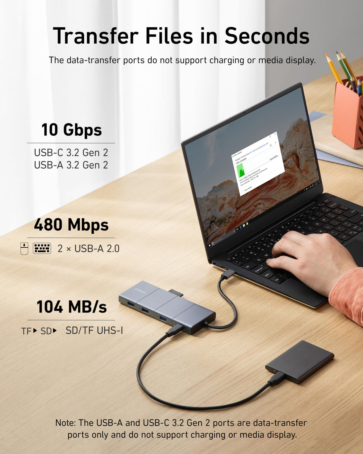 Anker 565 USB-C Hub 11-in-1 charging station with multiple ports and sleek black design for versatile connectivity.