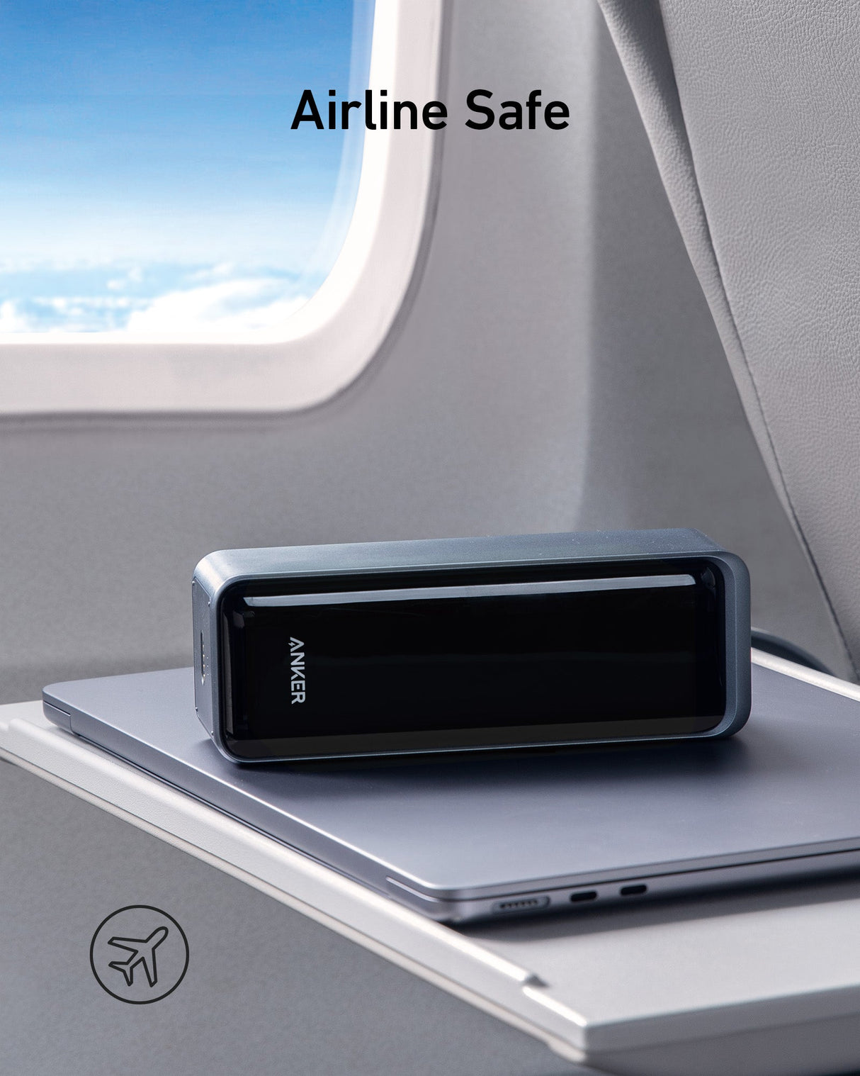 Anker Prime 27,650mAh power bank and 100W charging base, compact black charging device with ports and power indicators.