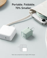 Anker Nano 30W charger connected to a smartphone, compact charging device for quick power delivery.