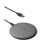 Anker 313 wireless charging pad for fast and convenient smartphone charging, black, slim design on a neutral surface.