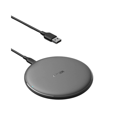 Anker 313 wireless charging pad for fast and convenient smartphone charging, black, slim design on a neutral surface.