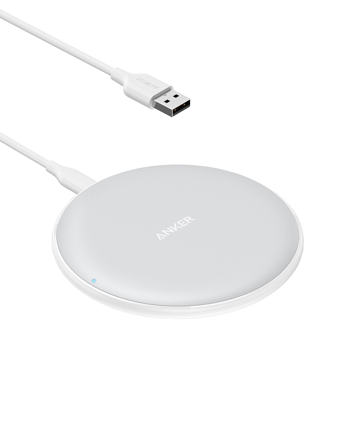 Anker 313 wireless charging pad for fast, cable-free charging of compatible smartphones on a sleek, minimalist surface.