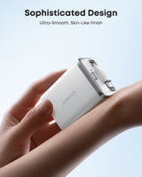 Anker Nano 35W charger with built-in retractable USB-C cable, compact and portable for fast charging devices.