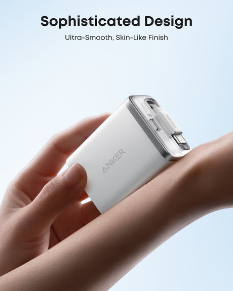 Anker Nano 35W charger with built-in retractable USB-C cable, compact and portable for fast charging devices.