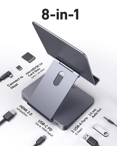 Anker 551 USB-C Hub with 8 ports, shown with tablet stand, designed for charging and expanding connectivity on electronic devices.