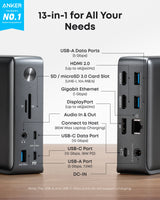 Anker 575 USB-C Docking Station for charging, showing multiple ports on a sleek black device with cables connected.