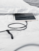 Anker 551 USB-A to Lightning charging cable in 3, 6, or 10 feet length, shown connected to a device for charging.