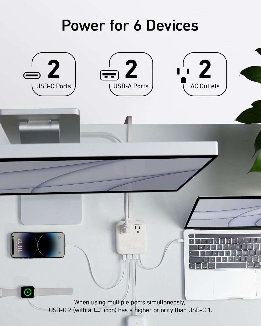 Anker Nano 6-in-1 67W charging station with multiple ports for fast charging devices, shown on a clean surface.