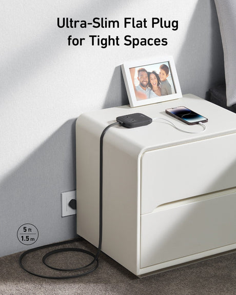 Anker Nano 6-in-1 67W charging station with multiple ports for fast device charging and sleek black design.