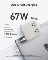 Anker Nano 6-in-1 67W charging station with multiple ports for fast device charging, compact design in black.