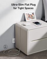 Anker Nano 6-in-1 67W charging station with multiple ports for fast charging of various devices, sleek black design.
