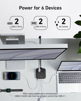 Anker Nano 6-in-1 67W charging station with multiple ports, compact design, and sleek black finish.