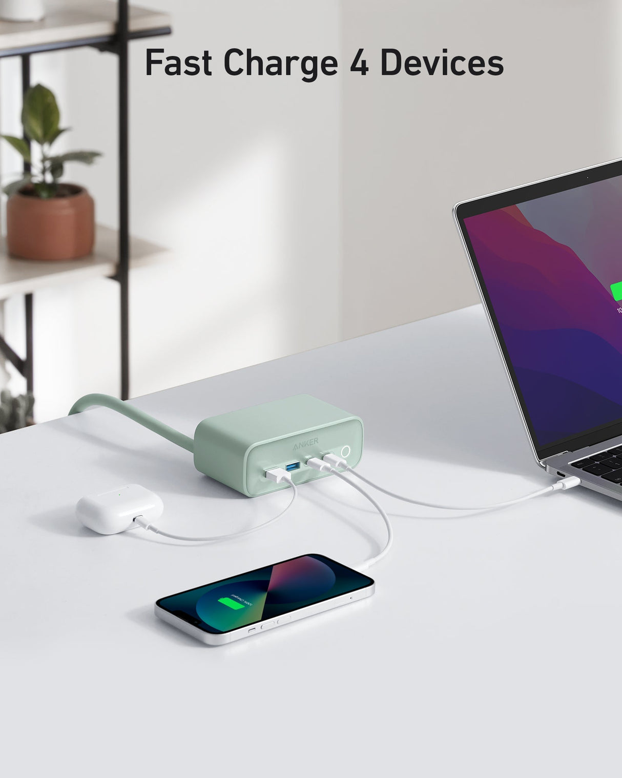 Anker 525 charging station for multiple devices, featuring sleek design and multiple charging ports on a white surface.