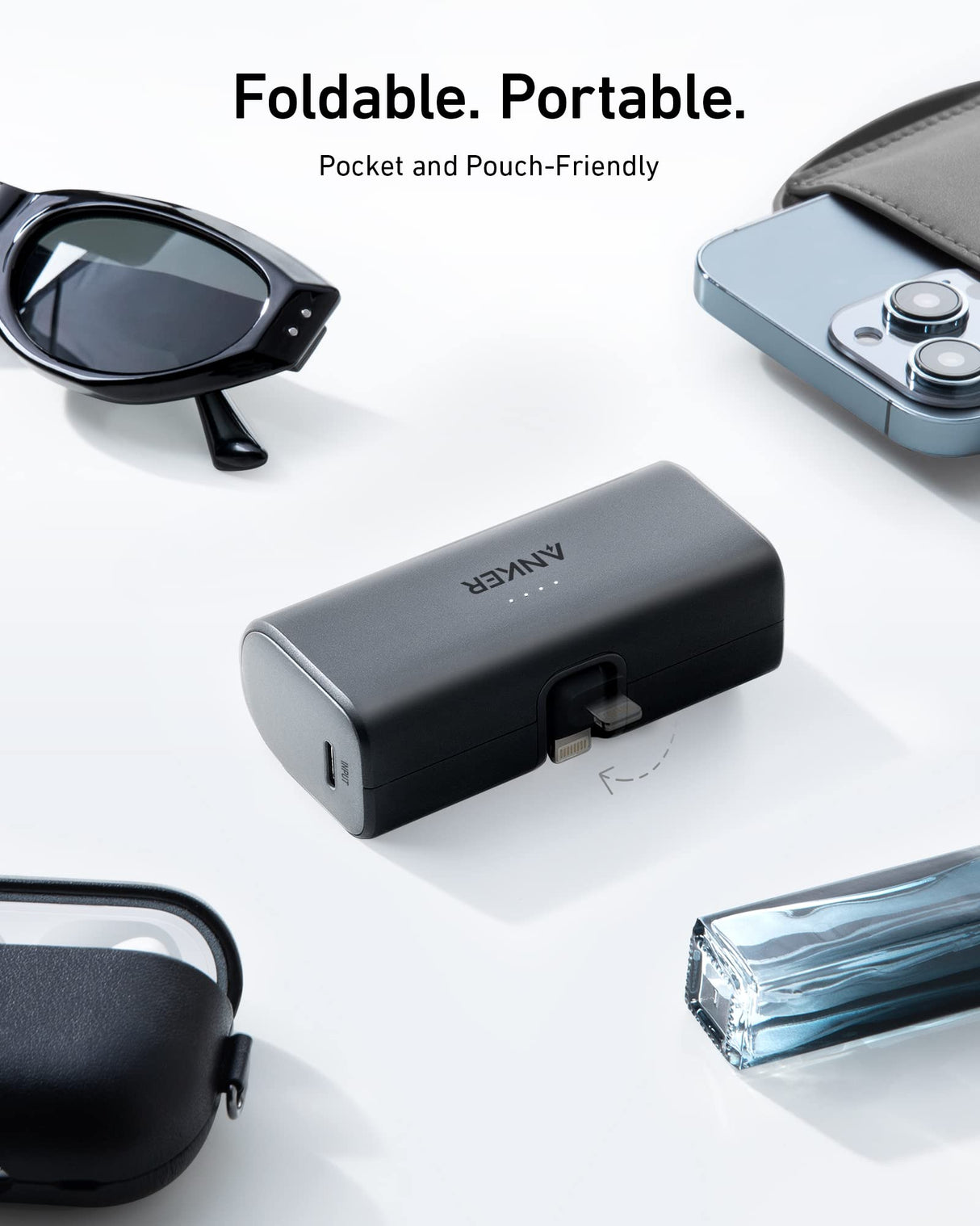 Black Anker Nano Power Bank with 12W charging and built-in Lightning connector for portable device charging.