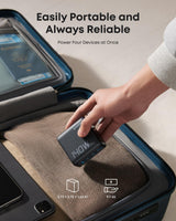 Anker 140W 4-port USB-C charger with PD 3.1 and a dark gray USB-C cable connected, compact and versatile for multiple devices.